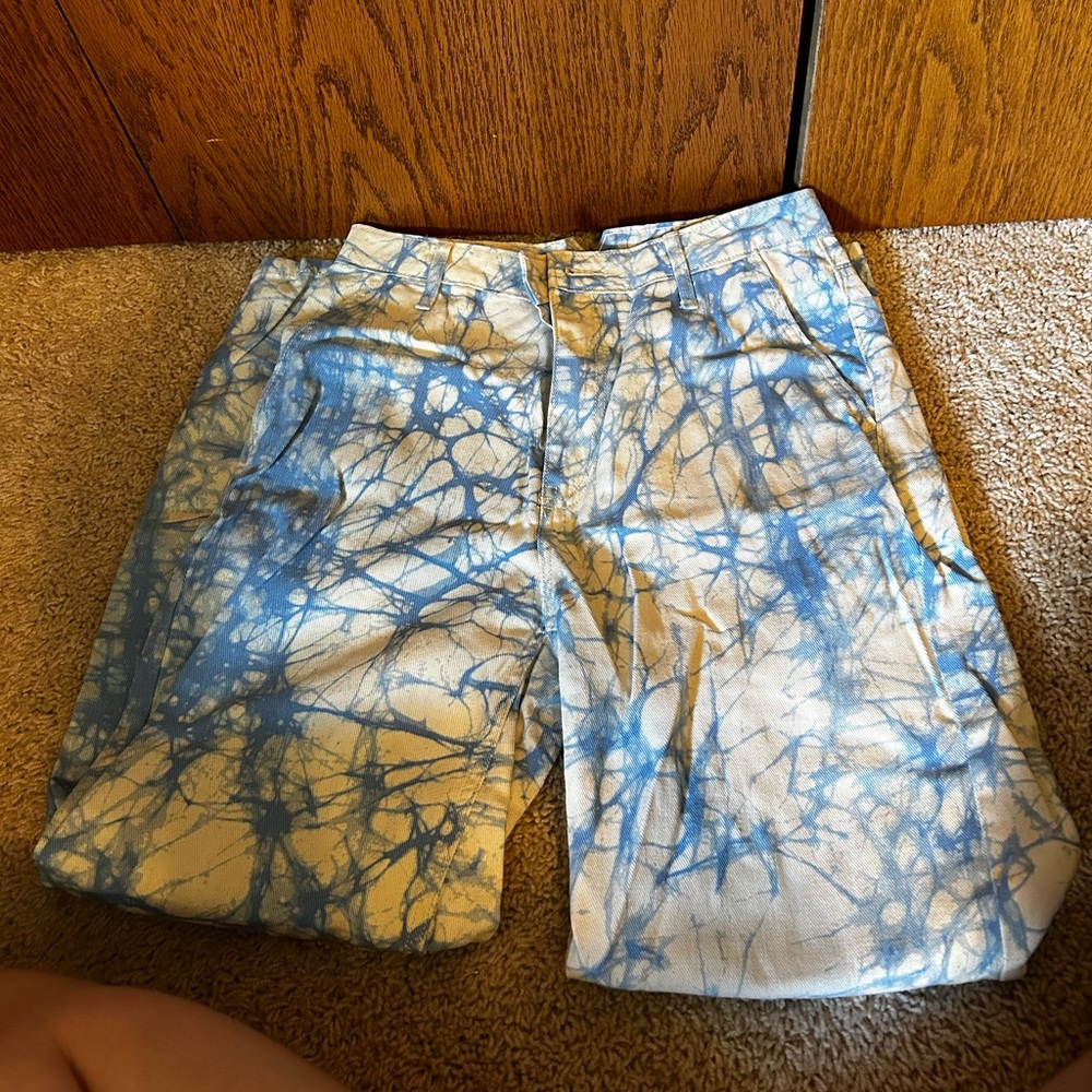 White and blue splashed jeans size 4.